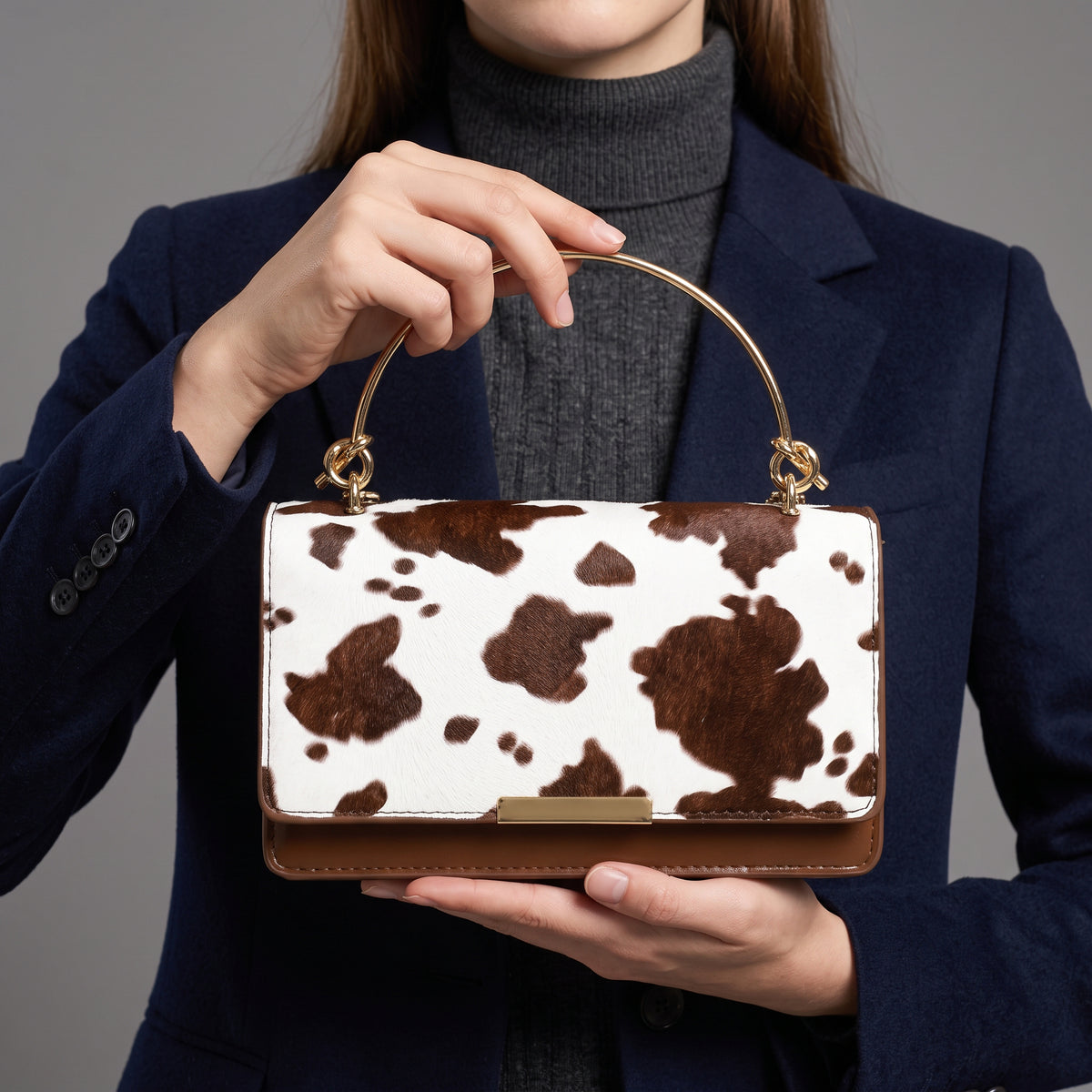 Clarissa Cowprint Clutch Bag