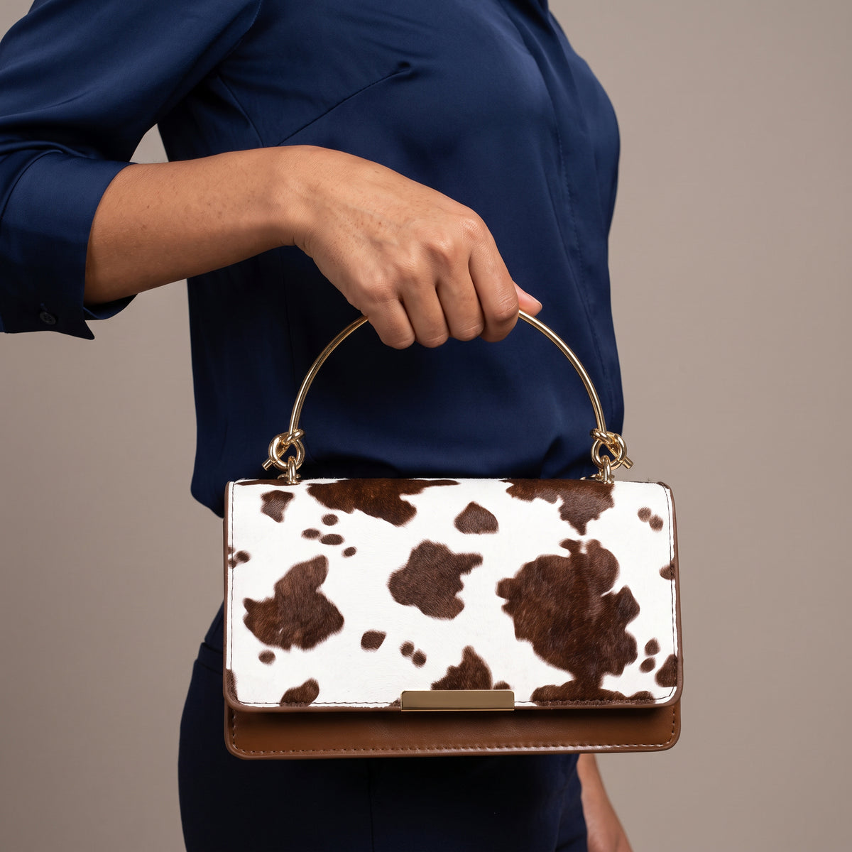 Clarissa Cowprint Clutch Bag