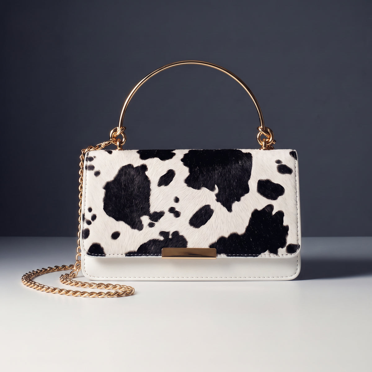 Clarissa Cowprint Clutch Bag