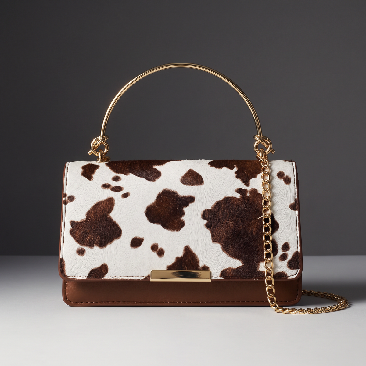 Clarissa Cowprint Clutch Bag