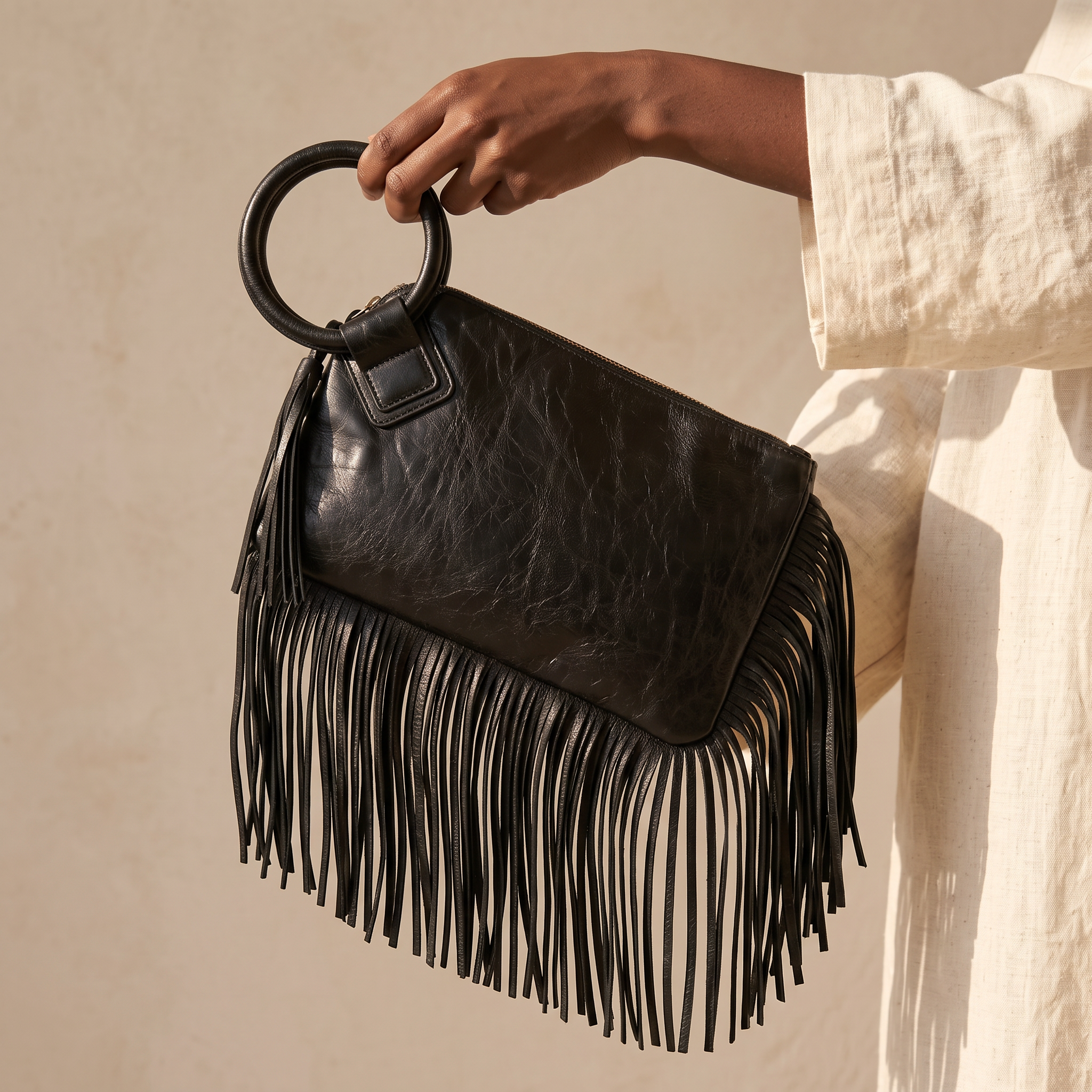 Aster Fringe Clutch Bag